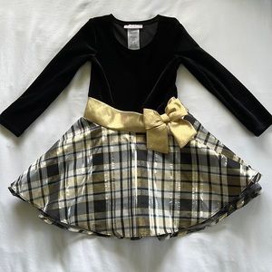 Black velvet dress with gold bow